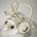Cameo and pearl necklace